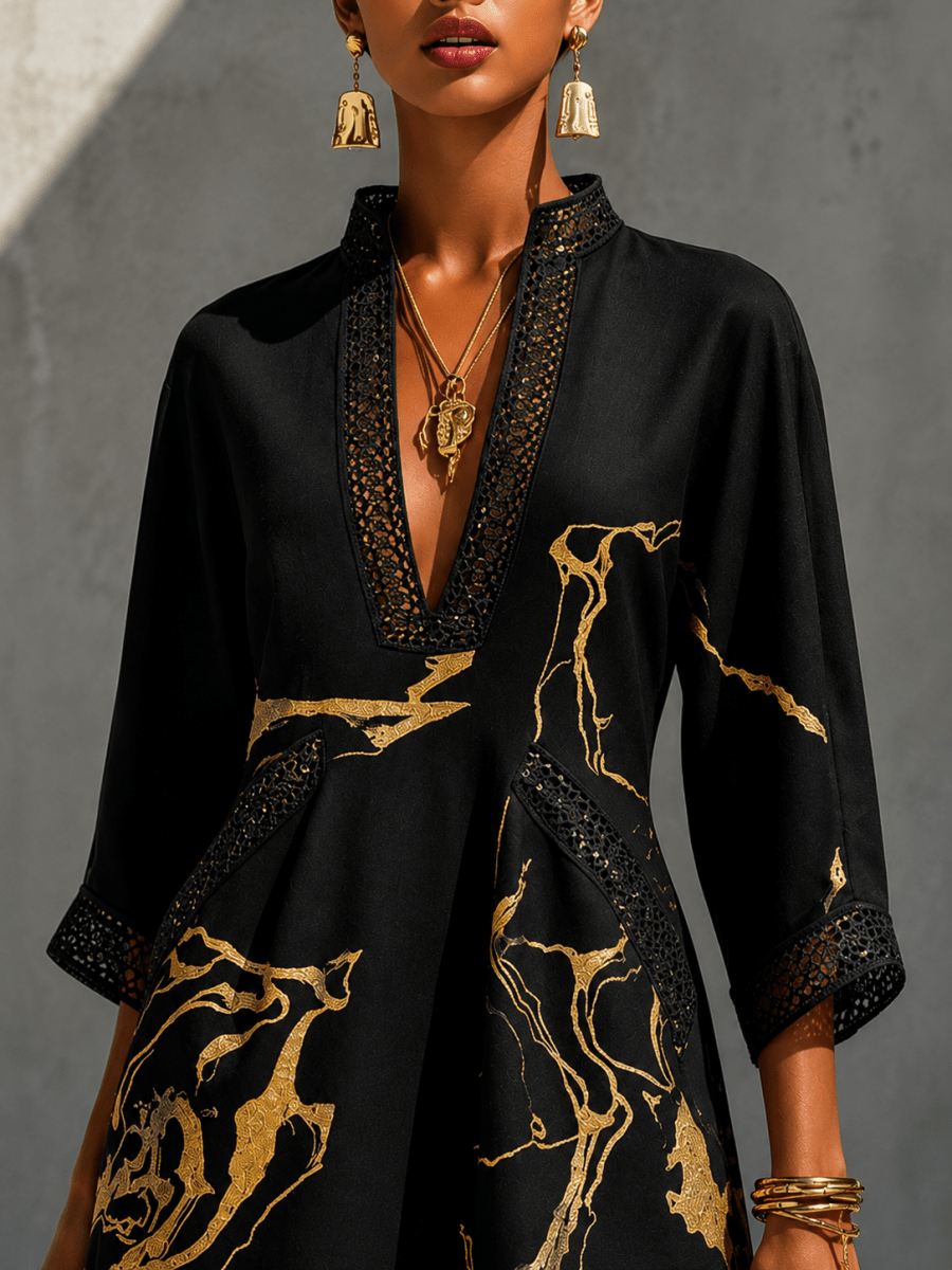 Vestido mini con cuello en V, estampado en negro y dorado S - Bianca Salvat
