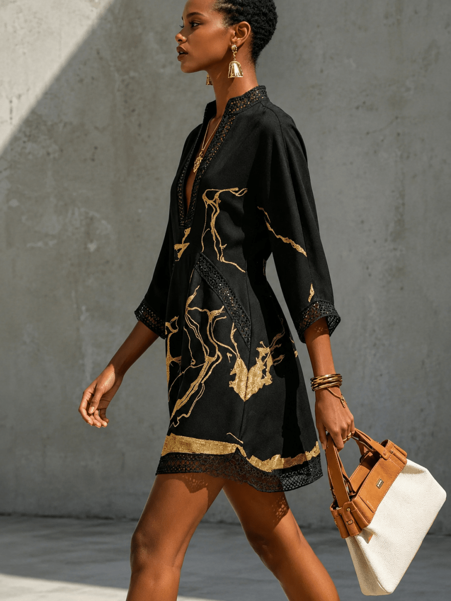 Vestido mini con cuello en V, estampado en negro y dorado S - Bianca Salvat